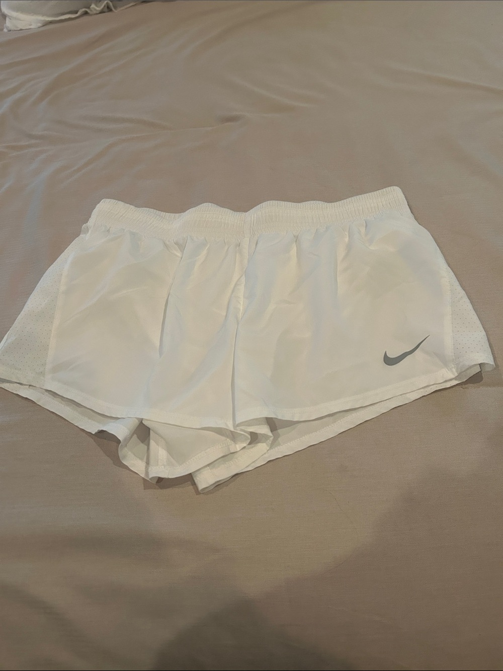 Nike White Athletic Running Shorts with Grey Swoosh - Women's